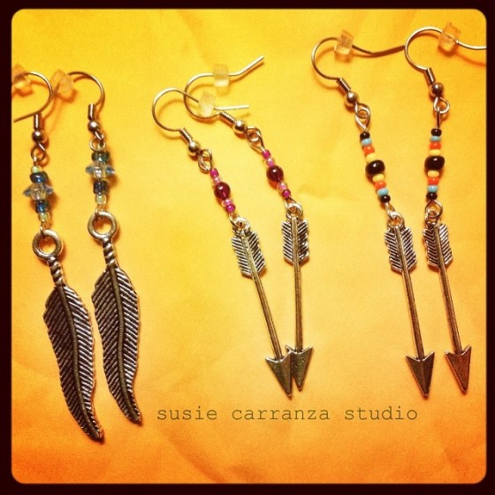 earrings: feathers and arrows