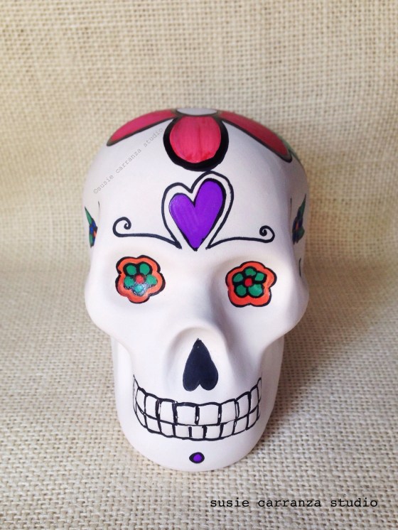 one of my hand painted ceramic skulls - what do you think?