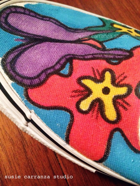 Close up of hand painted canvas shoes - susie carranza studio