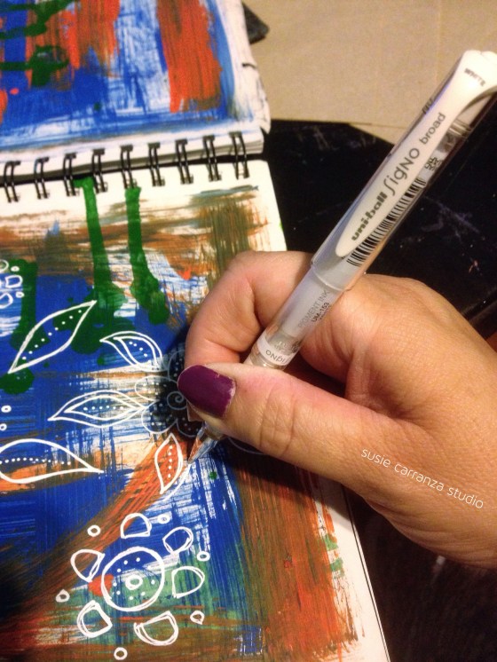 I've mentioned it before: I LOVE my Uni-ball white pigment pen!