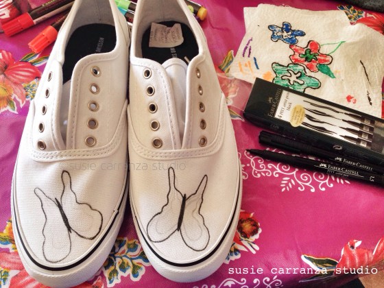 Drew butterflies with FaberCastell PITT Artist Pens in black...